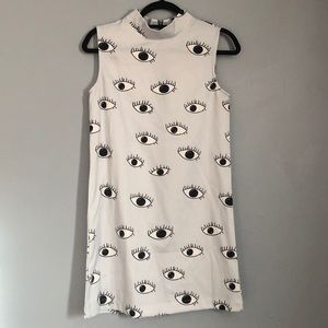 Surrealist eye printed mini dress